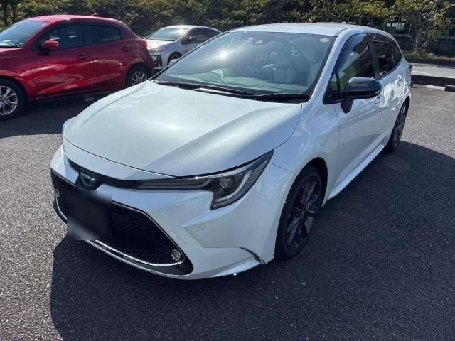 2022 Toyota Corolla Touring Hybrid - photo 1 2022 Toyota Corolla Touring Hybrid Van for sale, Japanese used car export - photo 1 of 9 | GULJI TRADERS