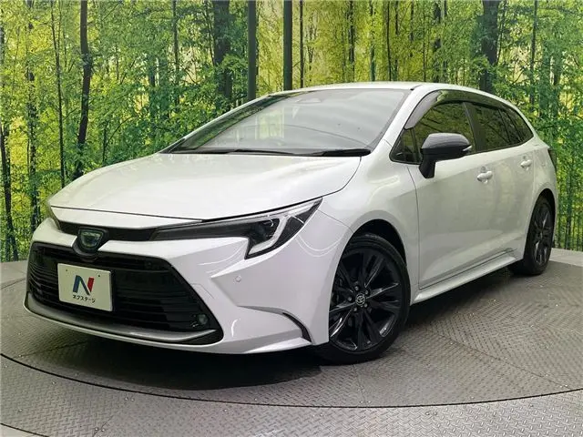 2023 Toyota Corolla Touring Hybrid Double B Pearl Van for sale, Japanese used car export - photo 1 of 30 | GULJI TRADERS