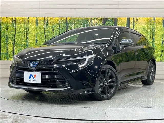 2023 Toyota Corolla Touring Hybrid Double By - photo 1 2023 Toyota Corolla Touring Hybrid Double By Black Van for sale, Japanese used car export - photo 1 of 30 | GULJI TRADERS