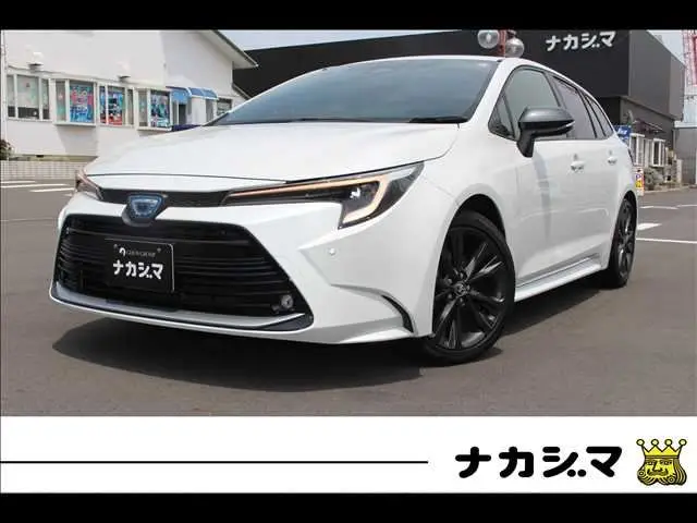 2023 Toyota Corolla Touring W×B (Hybrid) with vehicle inspection and maintenance included. - photo 1 2023 Toyota Corolla Touring W×B (Hybrid) with vehicle inspection and maintenance included. Pearl Van for sale, Japanese used car export - photo 1 of 20 | GULJI TRADERS