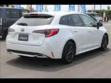 2023 Toyota Corolla Touring W×B (Hybrid) with vehicle inspection and maintenance included. Pearl Van for sale, Japanese used car export - photo 2 of 20 | GULJI TRADERS