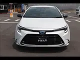 2023 Toyota Corolla Touring W×B (Hybrid) with vehicle inspection and maintenance included. Pearl Van for sale, Japanese used car export - photo 13 of 20 | GULJI TRADERS