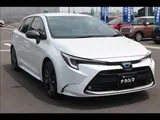 2023 Toyota Corolla Touring W×B (Hybrid) with vehicle inspection and maintenance included. Pearl Van for sale, Japanese used car export - photo 14 of 20 | GULJI TRADERS