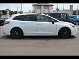 2023 Toyota Corolla Touring W×B (Hybrid) with vehicle inspection and maintenance included. Pearl Van for sale, Japanese used car export - photo 15 of 20 | GULJI TRADERS