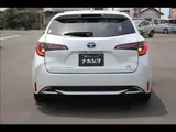 2023 Toyota Corolla Touring W×B (Hybrid) with vehicle inspection and maintenance included. Pearl Van for sale, Japanese used car export - photo 17 of 20 | GULJI TRADERS