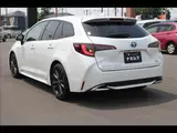 2023 Toyota Corolla Touring W×B (Hybrid) with vehicle inspection and maintenance included. Pearl Van for sale, Japanese used car export - photo 18 of 20 | GULJI TRADERS