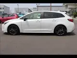 2023 Toyota Corolla Touring W×B (Hybrid) with vehicle inspection and maintenance included. Pearl Van for sale, Japanese used car export - photo 19 of 20 | GULJI TRADERS