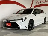2023 Toyota Corolla Touring Hybrid WXB 4WD ★Display Audio★ Pearl Van for sale, Japanese used car export - photo 1 of 75 | GULJI TRADERS