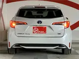 2023 Toyota Corolla Touring Hybrid WXB 4WD ★Display Audio★ Pearl Van for sale, Japanese used car export - photo 73 of 75 | GULJI TRADERS