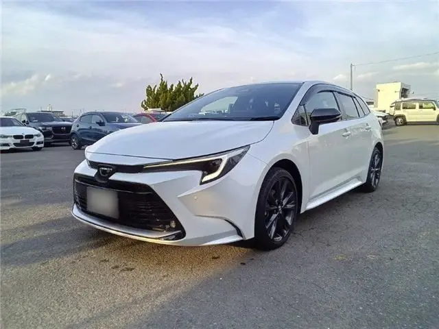 2023 Toyota Corolla Touring Double Bye - photo 1 2023 Toyota Corolla Touring Double Bye Pearl Van for sale, Japanese used car export - photo 1 of 44 | GULJI TRADERS
