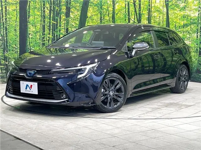 2023 Toyota Corolla Touring Hybrid Double By - photo 1 2023 Toyota Corolla Touring Hybrid Double By Black Van for sale, Japanese used car export - photo 1 of 30 | GULJI TRADERS