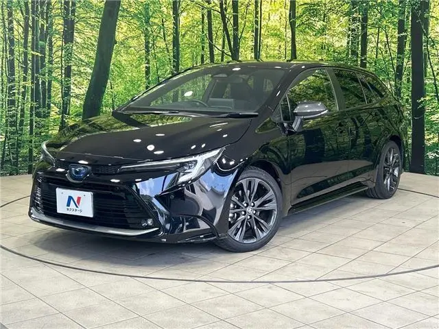 2023 Toyota Corolla Touring Hybrid Double By Black Van for sale, Japanese used car export - photo 1 of 30 | GULJI TRADERS