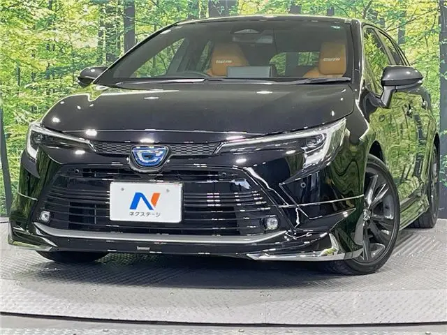 2023 Toyota Corolla Touring Hybrid Double By Black Van for sale, Japanese used car export - photo 1 of 30 | GULJI TRADERS