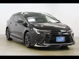 2023 Toyota Corolla Touring HYBRID W×B Modellista Aero 10.5-inch DA Navi Black Van for sale, Japanese used car export - photo 18 of 37 | GULJI TRADERS