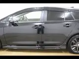 2023 Toyota Corolla Touring HYBRID W×B Modellista Aero 10.5-inch DA Navi Black Van for sale, Japanese used car export - photo 36 of 37 | GULJI TRADERS