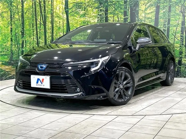 2023 Toyota Corolla Touring Hybrid Double By - photo 1 2023 Toyota Corolla Touring Hybrid Double By Black Van for sale, Japanese used car export - photo 1 of 30 | GULJI TRADERS