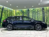 2023 Toyota Corolla Touring Hybrid Double By Black Van for sale, Japanese used car export - photo 11 of 30 | GULJI TRADERS