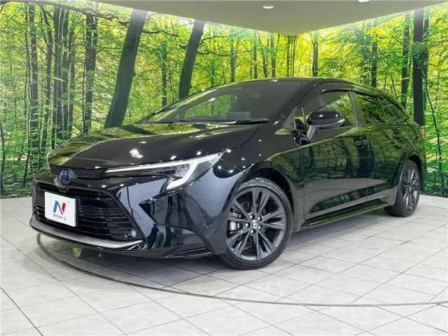 2023 Toyota Corolla Touring Hybrid Double By - photo 1 2023 Toyota Corolla Touring Hybrid Double By Black Van for sale, Japanese used car export - photo 1 of 30 | GULJI TRADERS