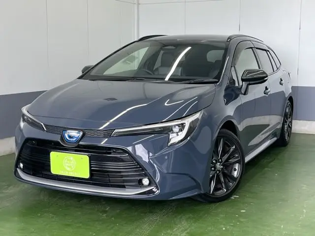 2023 Toyota Corolla Touring 1.8 Hybrid WxB E-Four 4WD - photo 1 2023 Toyota Corolla Touring 1.8 Hybrid WxB E-Four 4WD Gray Van for sale, Japanese used car export - photo 1 of 51 | GULJI TRADERS