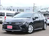 2023 Toyota Corolla Touring 1.8 Hybrid G ​​E-Four 4WD Black Van for sale, Japanese used car export - photo 1 of 25 | GULJI TRADERS