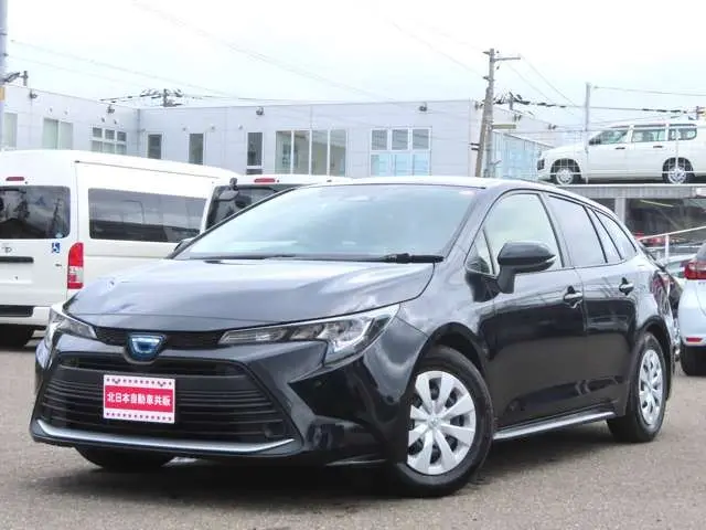 2023 Toyota Corolla Touring 1.8 Hybrid G ​​E-Four 4WD Black Van for sale, Japanese used car export - photo 1 of 25 | GULJI TRADERS