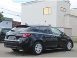 2023 Toyota Corolla Touring 1.8 Hybrid G ​​E-Four 4WD Black Van for sale, Japanese used car export - photo 2 of 25 | GULJI TRADERS