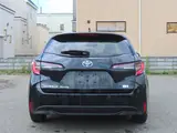 2023 Toyota Corolla Touring 1.8 Hybrid G ​​E-Four 4WD Black Van for sale, Japanese used car export - photo 6 of 25 | GULJI TRADERS