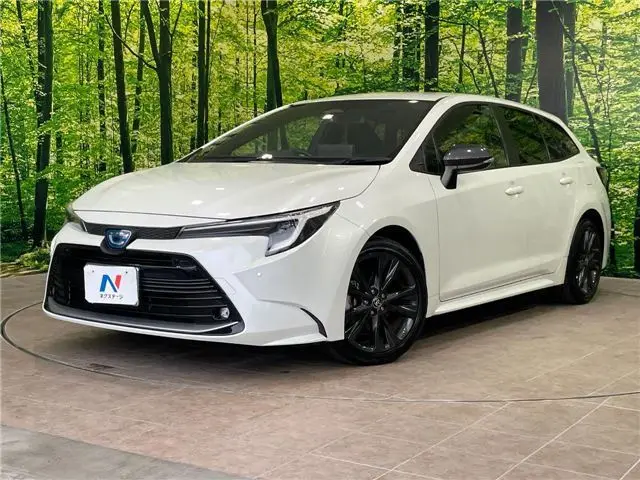 2023 Toyota Corolla Touring Hybrid Double By - photo 1 2023 Toyota Corolla Touring Hybrid Double By Pearl Van for sale, Japanese used car export - photo 1 of 30 | GULJI TRADERS
