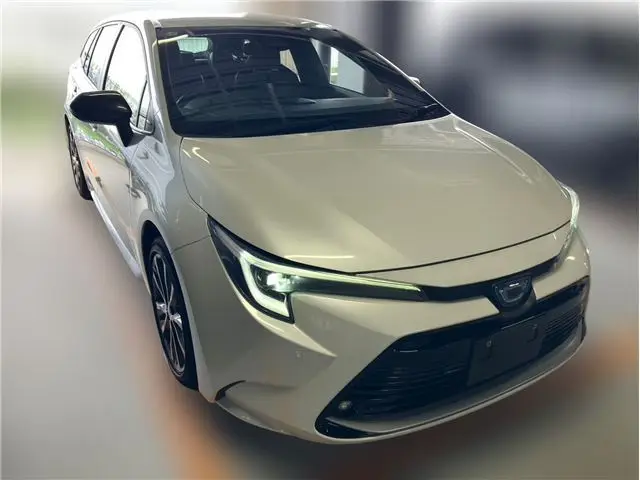 2023 Toyota Corolla Touring Hybrid Double By - photo 1 2023 Toyota Corolla Touring Hybrid Double By Pearl Van for sale, Japanese used car export - photo 1 of 13 | GULJI TRADERS