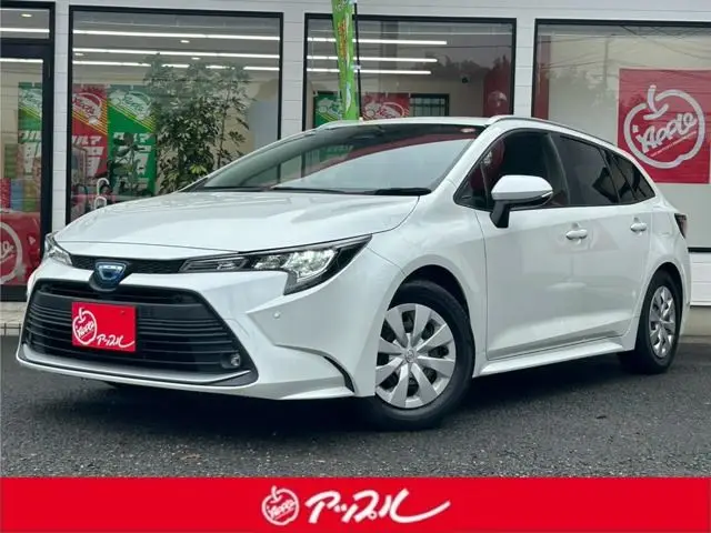 2023 Toyota Corolla Touring 1.8 Hybrid G E-Four 4WD - photo 1 2023 Toyota Corolla Touring 1.8 Hybrid G E-Four 4WD White Van for sale, Japanese used car export - photo 1 of 48 | GULJI TRADERS