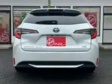 2023 Toyota Corolla Touring 1.8 Hybrid G ​​E-Four 4WD White Van for sale, Japanese used car export - photo 21 of 48 | GULJI TRADERS