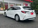 2023 Toyota Corolla Touring 1.8 Hybrid G ​​E-Four 4WD White Van for sale, Japanese used car export - photo 22 of 48 | GULJI TRADERS