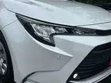 2023 Toyota Corolla Touring 1.8 Hybrid G ​​E-Four 4WD White Van for sale, Japanese used car export - photo 26 of 48 | GULJI TRADERS