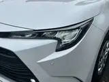 2023 Toyota Corolla Touring 1.8 Hybrid G ​​E-Four 4WD White Van for sale, Japanese used car export - photo 27 of 48 | GULJI TRADERS