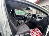 2023 Toyota Corolla Touring 1.8 Hybrid G ​​E-Four 4WD White Van for sale, Japanese used car export - photo 29 of 48 | GULJI TRADERS