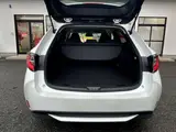 2023 Toyota Corolla Touring 1.8 Hybrid G ​​E-Four 4WD White Van for sale, Japanese used car export - photo 32 of 48 | GULJI TRADERS