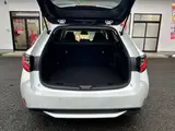 2023 Toyota Corolla Touring 1.8 Hybrid G ​​E-Four 4WD White Van for sale, Japanese used car export - photo 33 of 48 | GULJI TRADERS