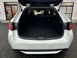 2023 Toyota Corolla Touring 1.8 Hybrid G ​​E-Four 4WD White Van for sale, Japanese used car export - photo 34 of 48 | GULJI TRADERS