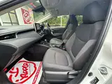 2023 Toyota Corolla Touring 1.8 Hybrid G ​​E-Four 4WD White Van for sale, Japanese used car export - photo 38 of 48 | GULJI TRADERS