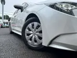 2023 Toyota Corolla Touring 1.8 Hybrid G ​​E-Four 4WD White Van for sale, Japanese used car export - photo 40 of 48 | GULJI TRADERS