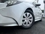 2023 Toyota Corolla Touring 1.8 Hybrid G ​​E-Four 4WD White Van for sale, Japanese used car export - photo 41 of 48 | GULJI TRADERS
