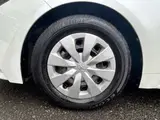 2023 Toyota Corolla Touring 1.8 Hybrid G ​​E-Four 4WD White Van for sale, Japanese used car export - photo 45 of 48 | GULJI TRADERS