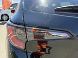 2023 Toyota Corolla Touring Hybrid Double Bye ★ Non-Smoking ★ Modellista ★ Pure Navi Black Van for sale, Japanese used car export - photo 45 of 50 | GULJI TRADERS