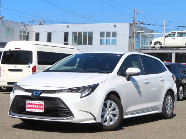 2023 Toyota Corolla Touring 1.8 Hybrid G E-Four 4WD Van for sale, Japanese used car export - photo 1 of 23 | GULJI TRADERS