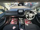 2023 Toyota Corolla Touring 1.8 Hybrid G ​​E-Four 4WD White Van for sale, Japanese used car export - photo 2 of 50 | GULJI TRADERS