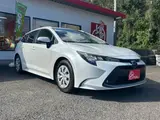 2023 Toyota Corolla Touring 1.8 Hybrid G ​​E-Four 4WD White Van for sale, Japanese used car export - photo 21 of 50 | GULJI TRADERS