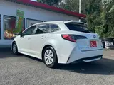 2023 Toyota Corolla Touring 1.8 Hybrid G ​​E-Four 4WD White Van for sale, Japanese used car export - photo 23 of 50 | GULJI TRADERS