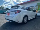 2023 Toyota Corolla Touring 1.8 Hybrid G ​​E-Four 4WD White Van for sale, Japanese used car export - photo 24 of 50 | GULJI TRADERS