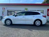 2023 Toyota Corolla Touring 1.8 Hybrid G ​​E-Four 4WD White Van for sale, Japanese used car export - photo 25 of 50 | GULJI TRADERS