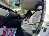 2023 Toyota Corolla Touring 1.8 Hybrid G ​​E-Four 4WD White Van for sale, Japanese used car export - photo 39 of 50 | GULJI TRADERS